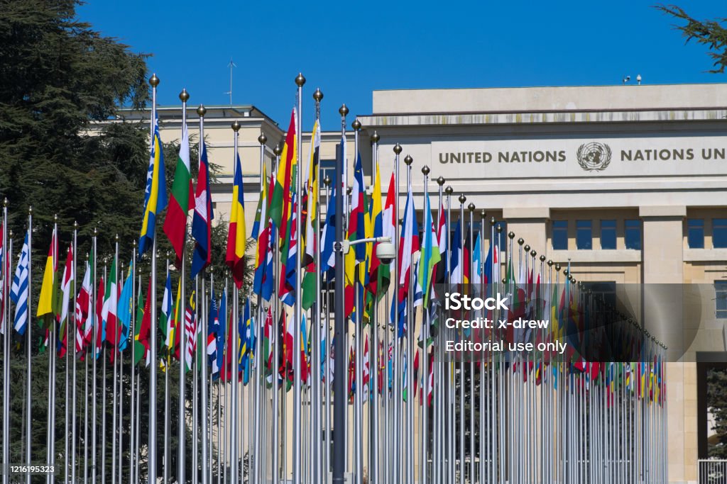 Flags at UN entrance Gallery of international flags at UN entrance in Geneva United Nations Building Stock Photo Flags at UN entrance Gallery of international flags at UN entrance in Geneva United Nations Building Stock Photo