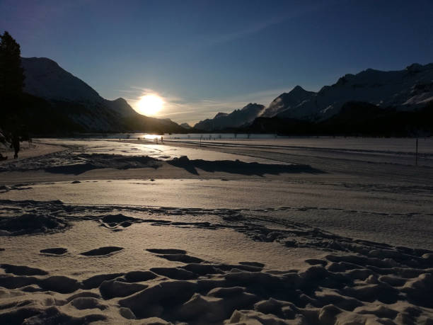 istock Snowy landscape at sunset in the Engadine 1216195359