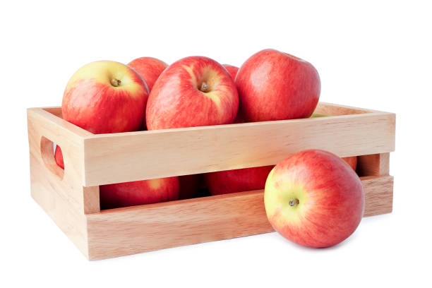 istock Apple fruit in wooden box isolate on white background with clipping path. 1216197304