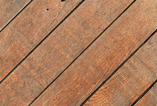 istock Old wooden light rustic diagonal lines from left down to up right texture background 1216201772