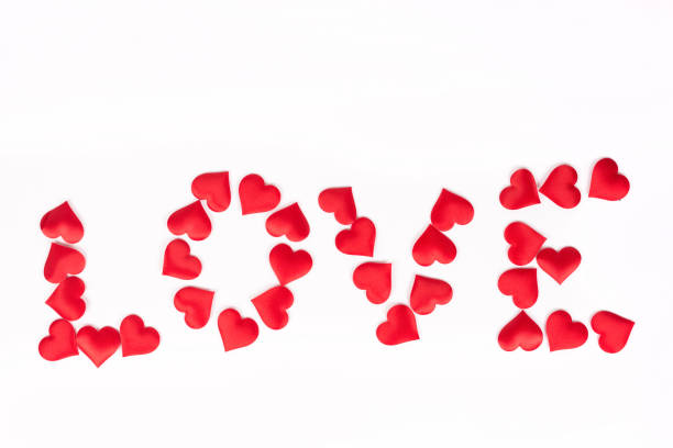 istock Text love made with red hearts isolated above white background 1216201992