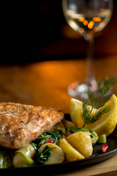 istock Salmon fillet with gratinated potatoes, leek and spinach 1216202065