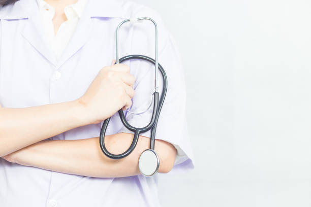istock Female doctor holds a folded stethoscope in his hand. 1216204799