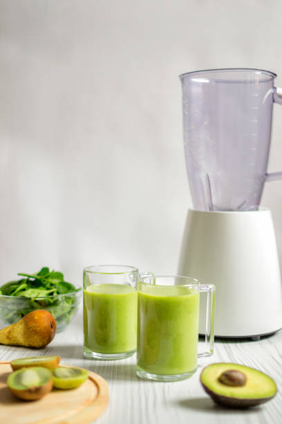 istock Green smoothie in glasses 1216205076