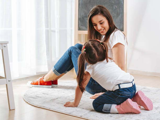 istock Mother with daughter having fun time together 1216206254