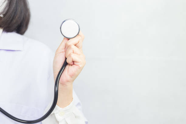 Doctor with a stethoscope, focus on the stethoscope.