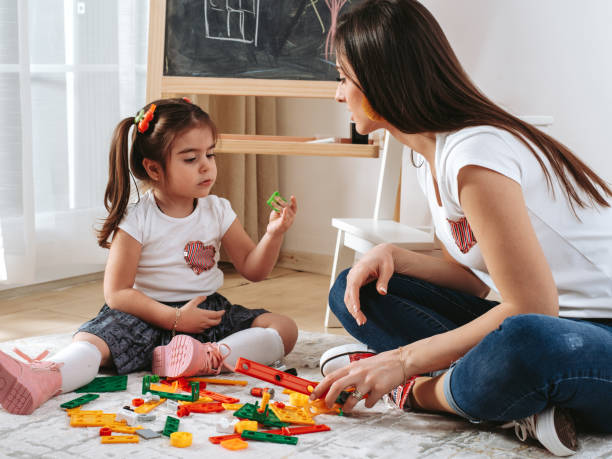 istock Mother with daughter having fun time together 1216207256