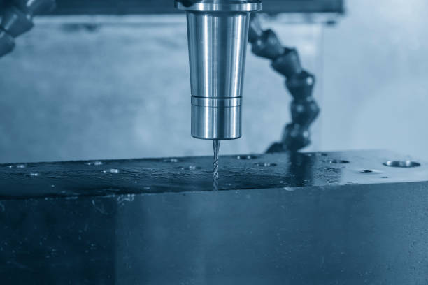 istock The tapping process on CNC milling machine in the light blue scene. 1216208600