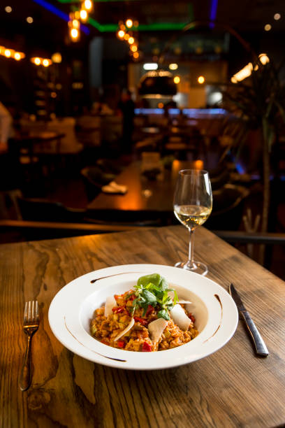 istock Risotto with vegetables in red sauce 1216208606