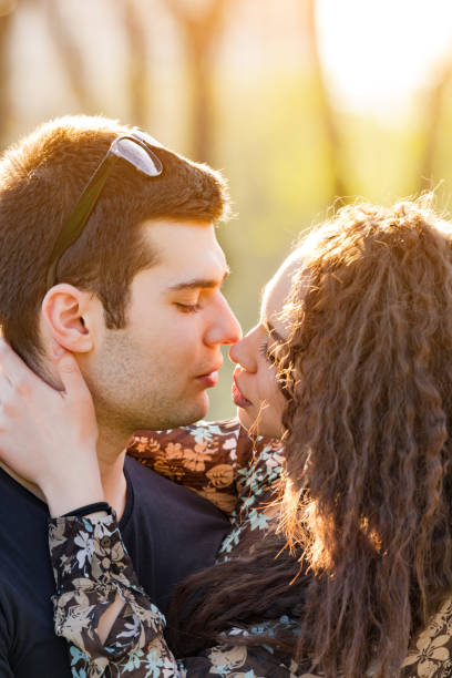 istock Modern urban couple posing in the park. 1216209344
