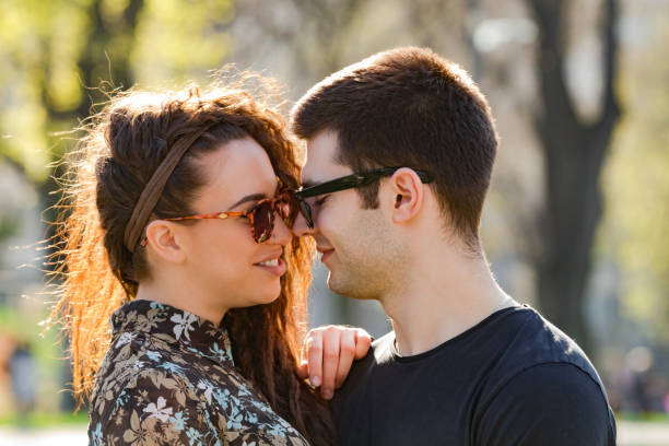 istock Modern urban couple posing in the park. 1216209373