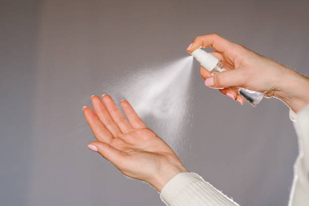 istock Hands applying alcohol spray or anti bacteria spray. Personal hygiene concept. Coronavirus. Cleaning hands with sanitizer gel. Prevent the spread of germs and avoid infections coronavirus. 1216210666