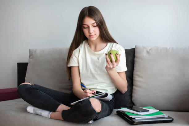 istock Teenager girl is learning 1216214154