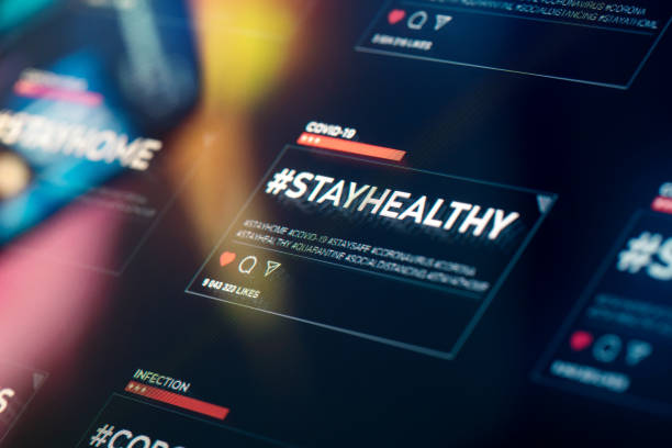 istock #stayhealthy. Stay Healthy hashtag close-up on digital display 1216214659