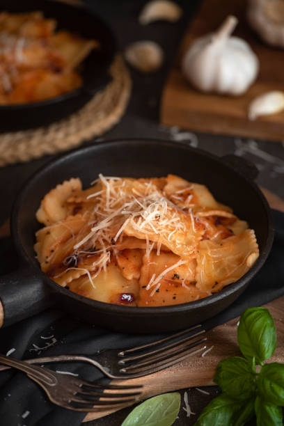 istock Ravioli pasta with tomato sauce 1216215810
