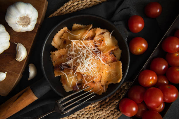 istock Ravioli pasta with tomato sauce 1216215991