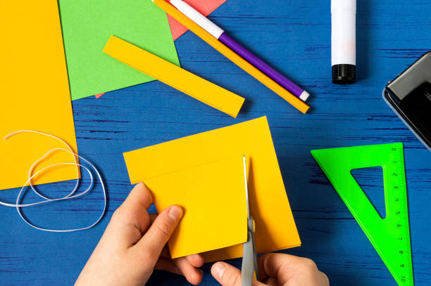 istock Child makes card for Mother's Day. Step 3 1216217776