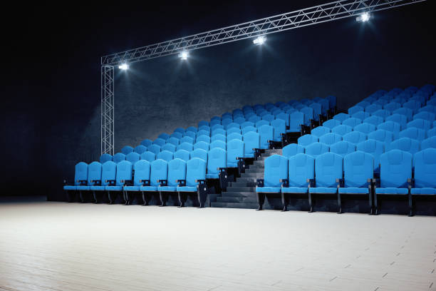istock Modern movie theater with blue chairs 1216217953