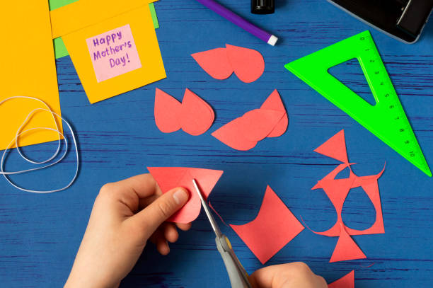istock Child makes card for Mother's Day. Step 7 1216217979
