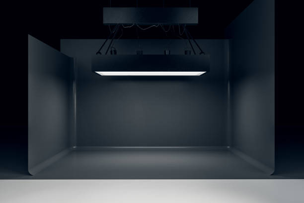 istock Photo studio with lighting equipment and black background 1216219232