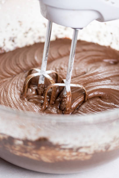 istock Mixing chocolate cream ganache with hand mixer 1216219245