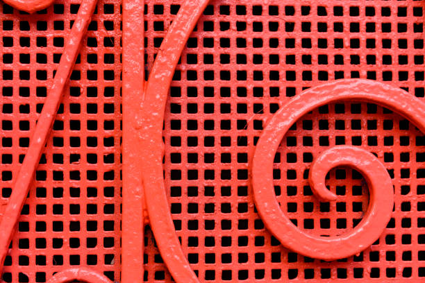 abstract red painted metal detail of an exterior security door in san juan puerto rico - puerto de sol imagens e fotografias de stock