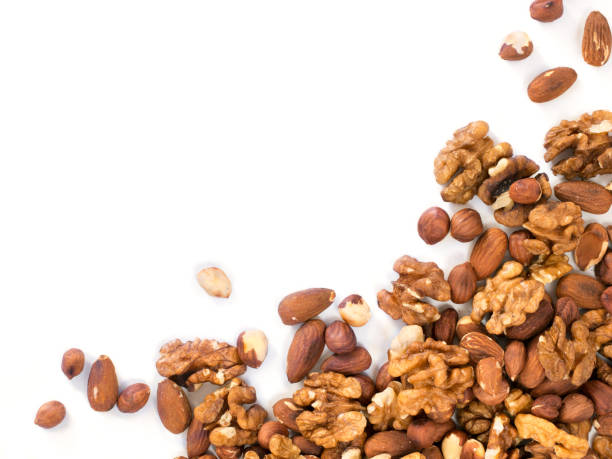 istock Background of mixed nuts with copy space 1216222523