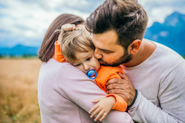 istock Happy young family in nature 1216223933