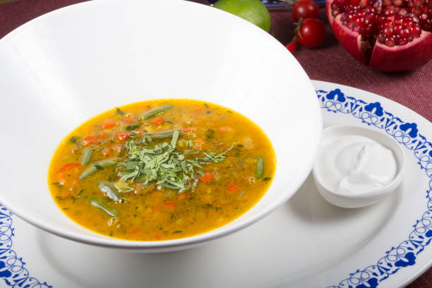 istock Yellow curry soup in a white bowl 1216224030