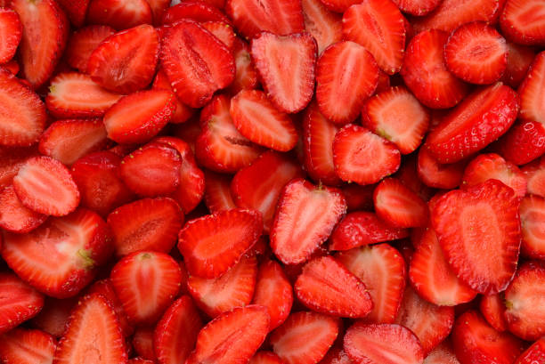 istock Strawberry slices. Fresh berries macro. Fruit background. Top view. 1216224729