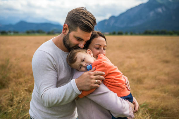 istock Happy young family in nature 1216224775