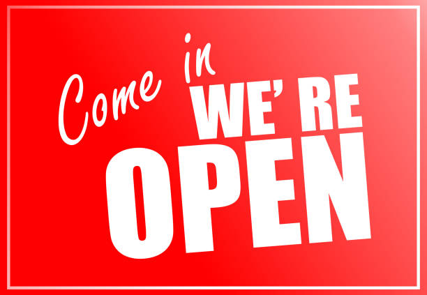 istock Come in we re open sign red color, white text 1216225716