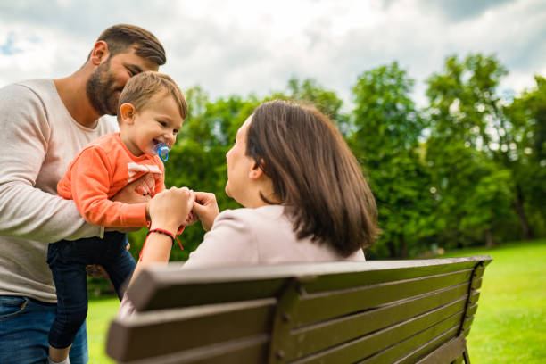 istock Happy young family in nature 1216226337