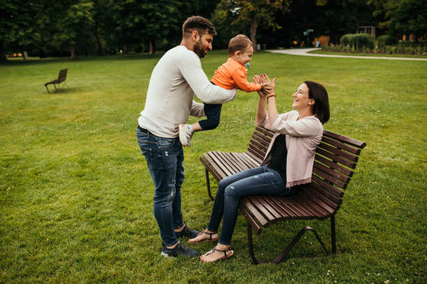 istock Happy young family in nature 1216226406
