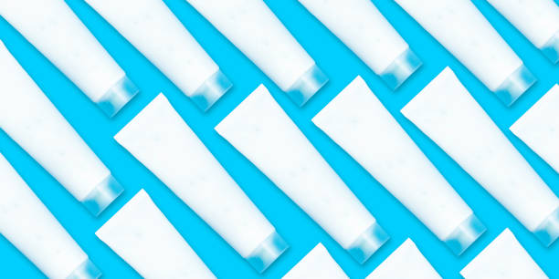 istock pattern beauty cosmetics  tube; branding mock up isolated on  blue background. Package for hand cream or scrub. Beauty cosmetics tube, branding mock up 1216226871