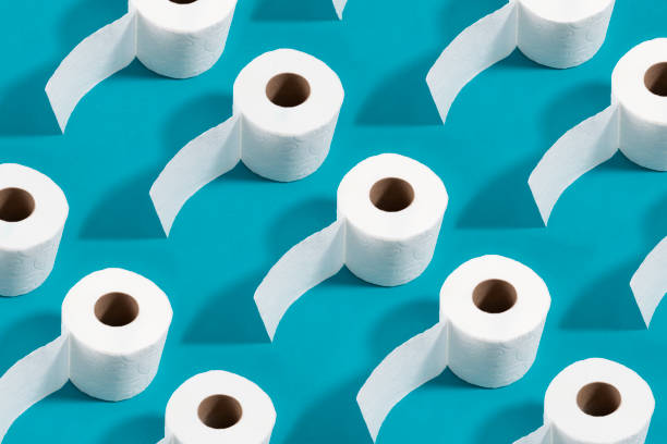 istock White Toilet Paper on Blue Background 1216227101