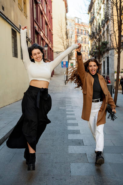 istock Two caucasian women having fun 1216228671
