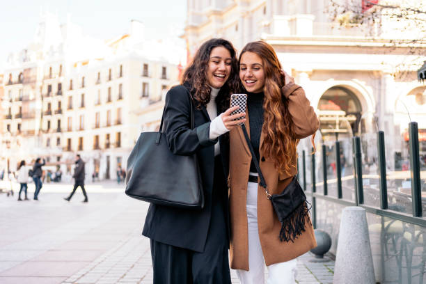 istock Two caucasian women with a smartphone 1216228707