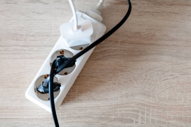 istock extension cord with electrical appliances 1216229796
