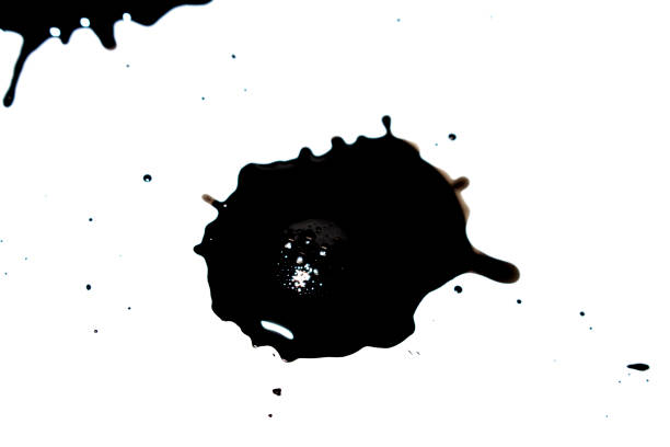 istock Black Ink Paint Splatter Drip on White Background 1216229826