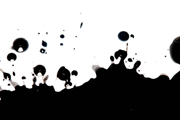 istock Black Ink Paint Splatter Drip on White Background 1216231471