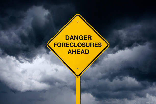 istock Danger Foreclosures Ahead Road Sign 1216235415