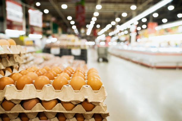 Fresh chicken eggs for choosing in supermarket, buying and hoarding during the Covid-19, Corona virus epidemic. Preparing for pathogen virus pandemic