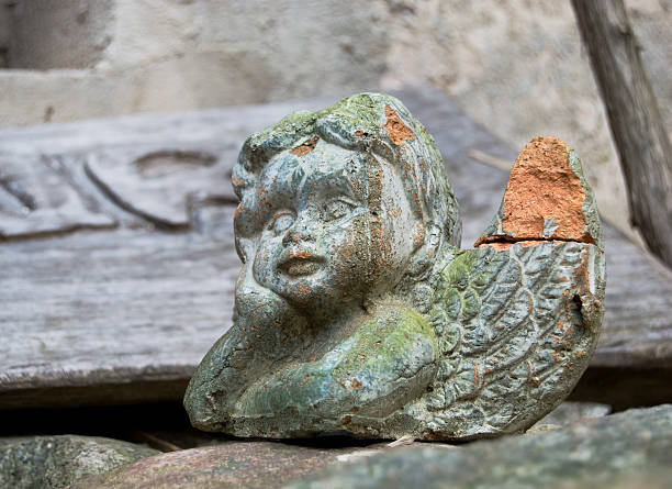 istock melancholy angel, stone cherub 121624212