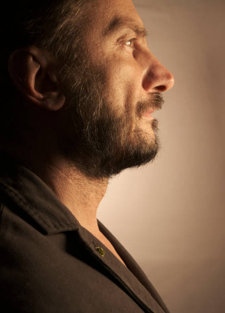 istock Portrait of Solitary Man - Profile 1216246474