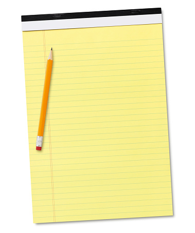 Yellow lined note pad with pencil isolated on white background