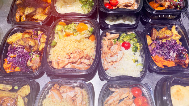 istock Different types of prepared dishes in disposable containers in the store. 1216251858