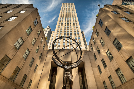 Manhattan, New York - September 21, 2019:  Low angle view of the Atlas Statue in front of the Rockefeller Center in midtown Manhattan New York City USA