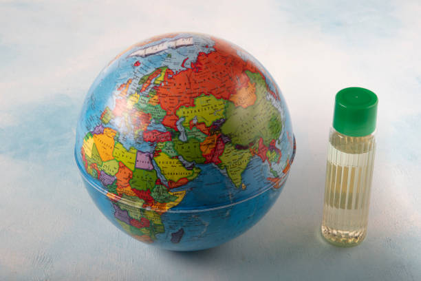 istock Globe and cologne ( kolonya ) isolated on blue background.Healthy days concept. 1216252254