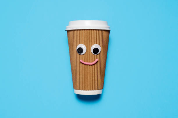 istock Happy and smiling disposable coffee cup 1216252298
